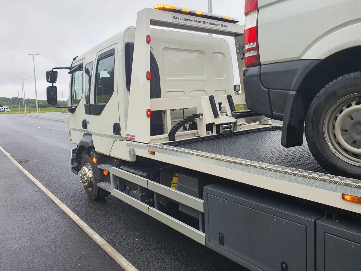 Breakdown Man Iveco recovery truck on the roadside with a casualty van behind it on the way back from Blackpool.