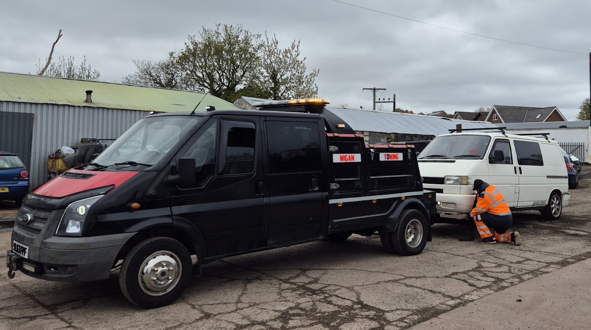 Simon towing a VW Transporter in Wigan yard.