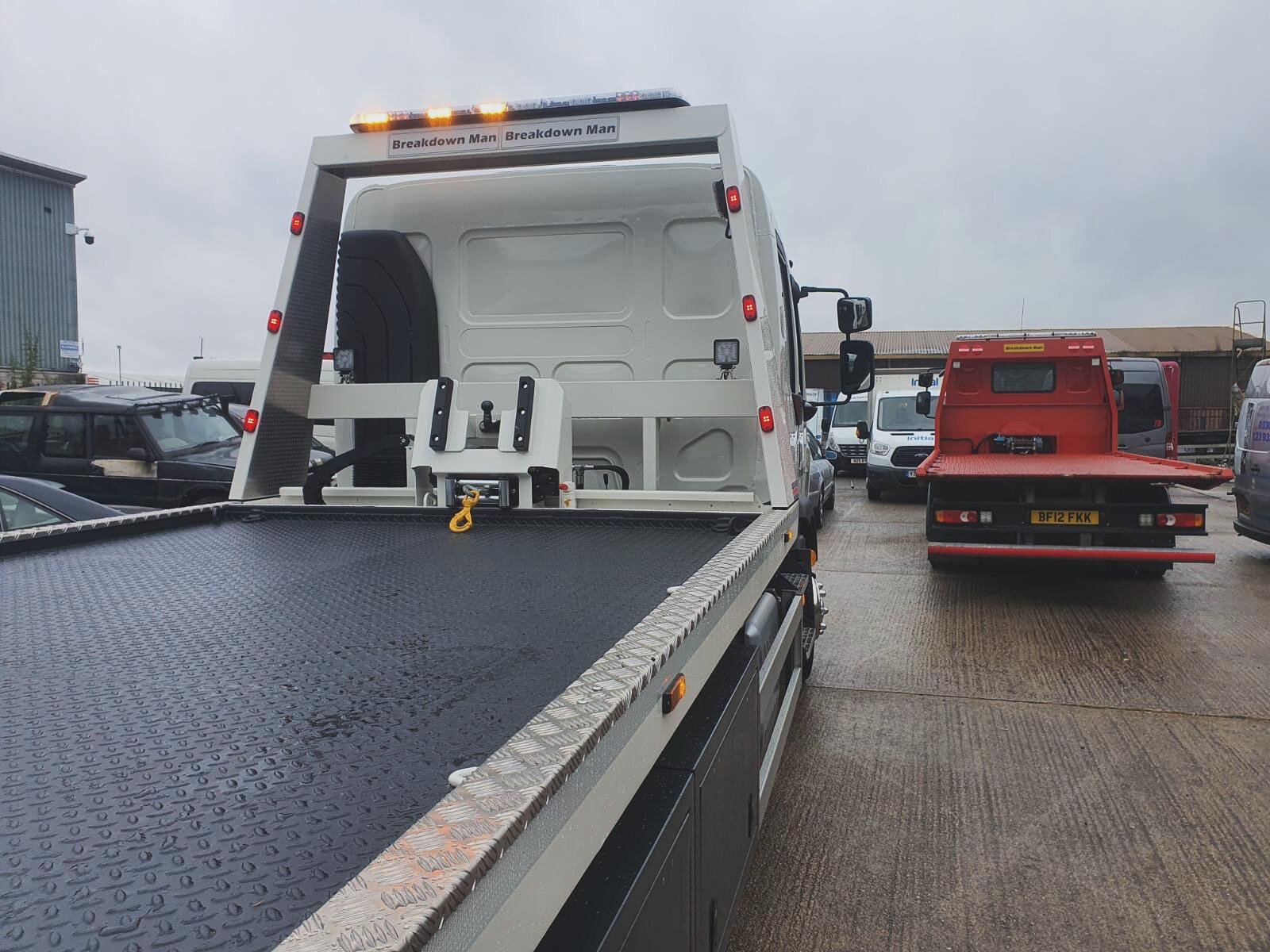 The Breakdown Man recovery truck at the depot, branded with light bar and beacon, ready to dispatch.